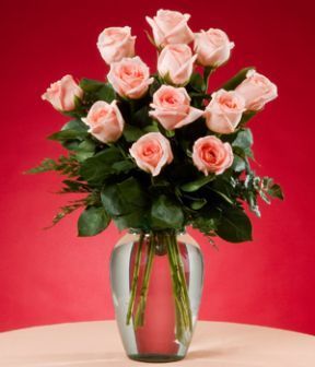 florero de rosas rosadas